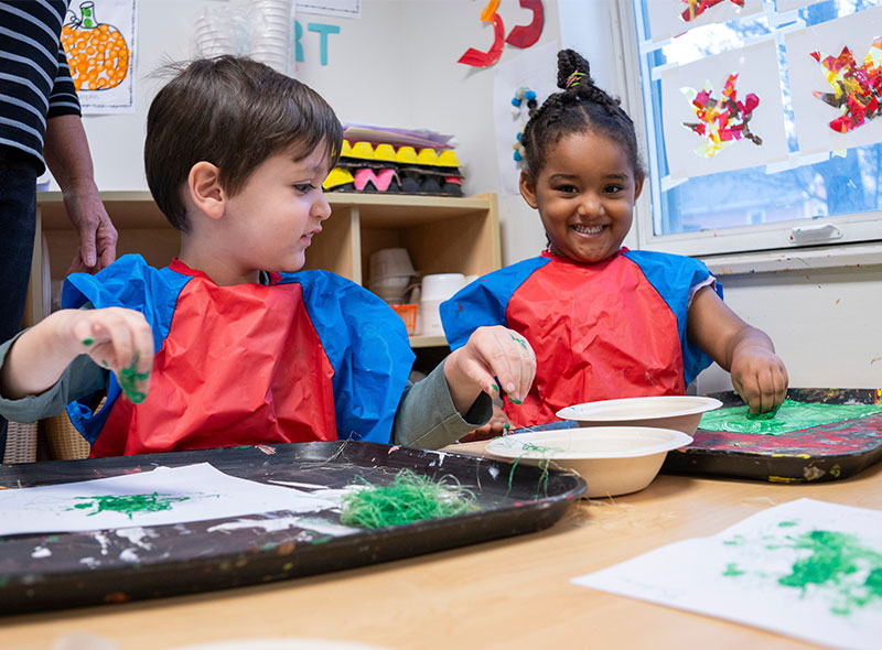 two children painting