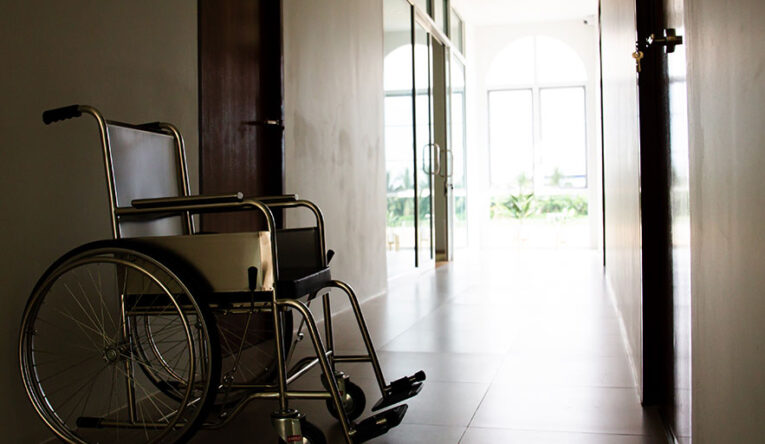 empty wheelchair in nursing home