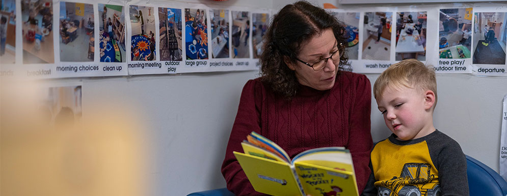 teacher reading to child